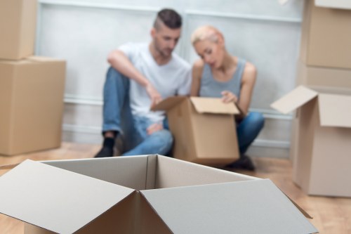 Wandsworth flat removals with movers navigating stairs and building access